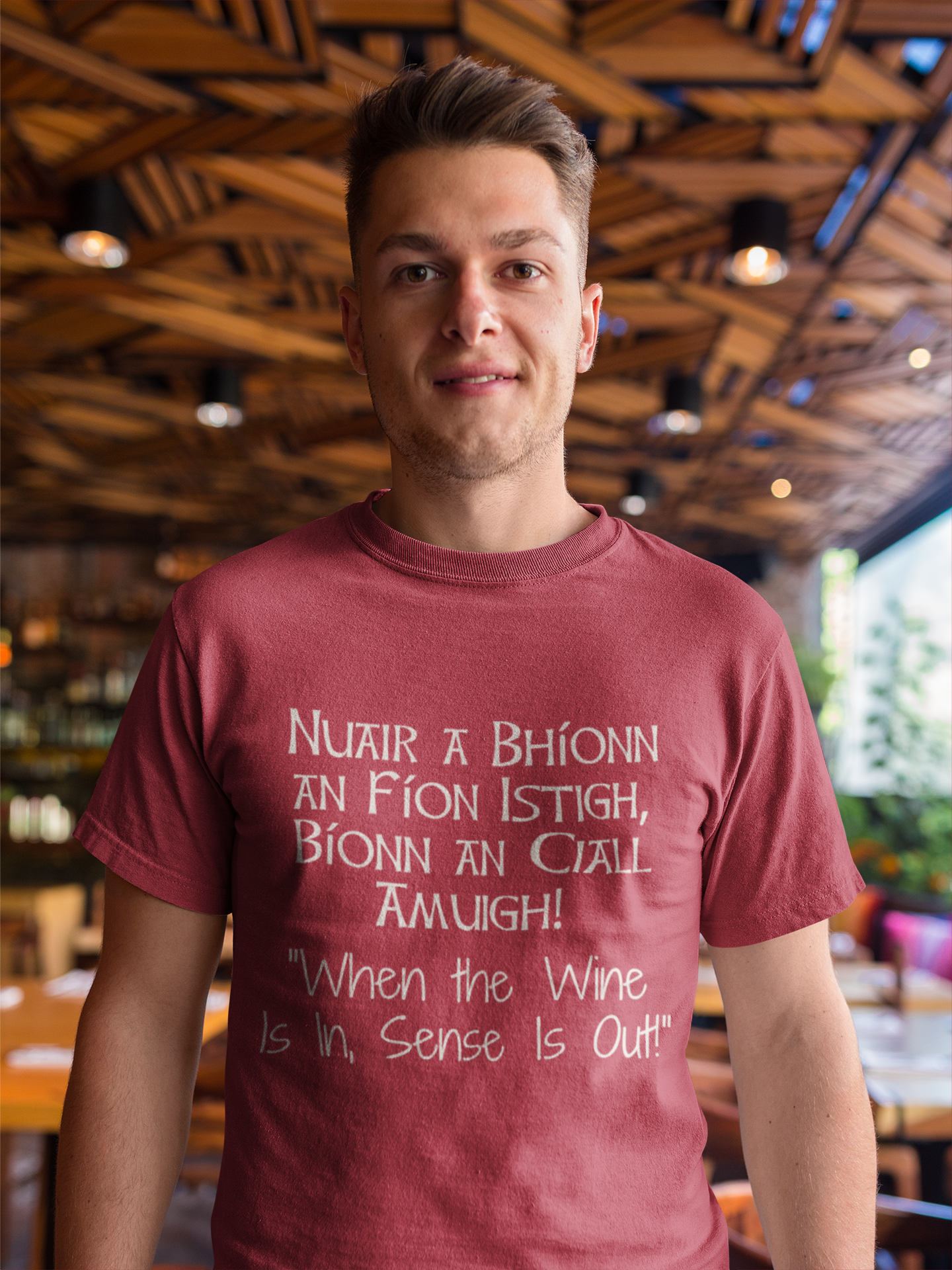 Nuair a Bhíonn an Fíon Istigh, - Short-Sleeve Unisex T-Shirt - Black, Red, Forest - Eel & Otter